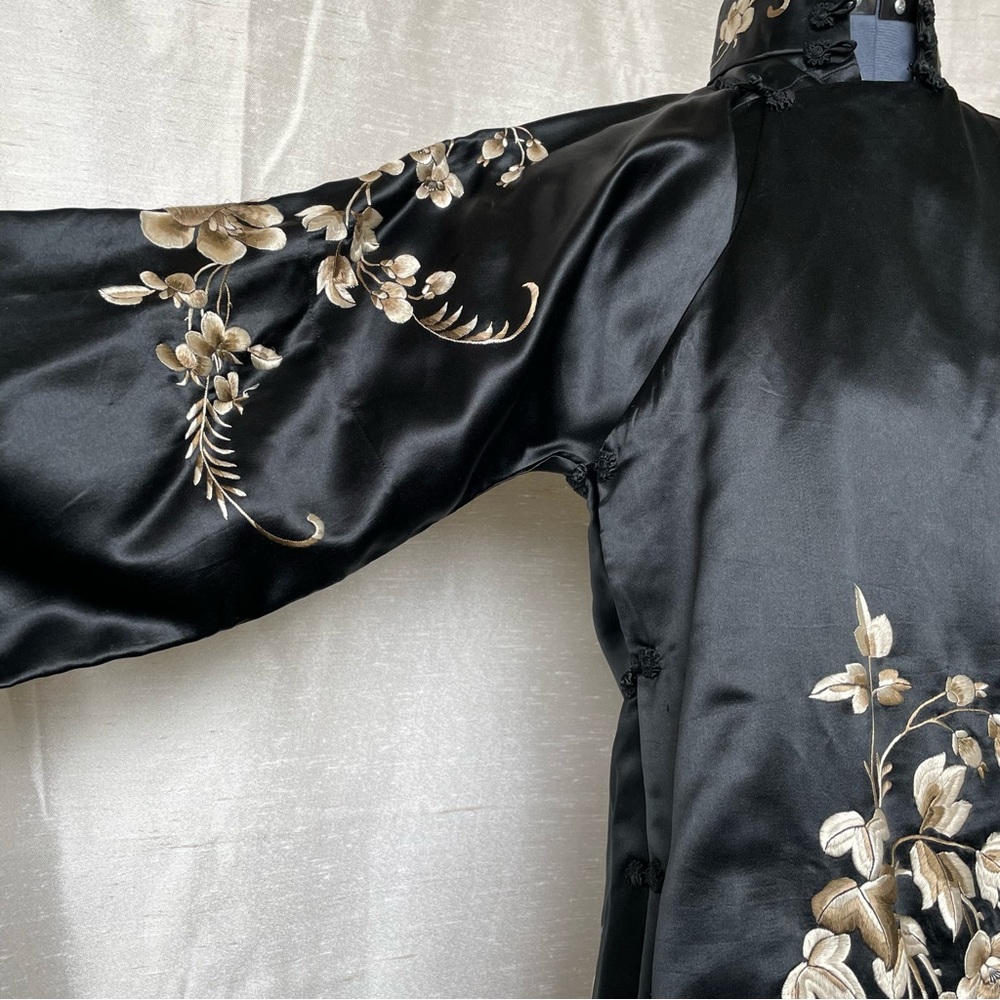 Gorgeous black & tan embroidered dress with sea green lining, size M